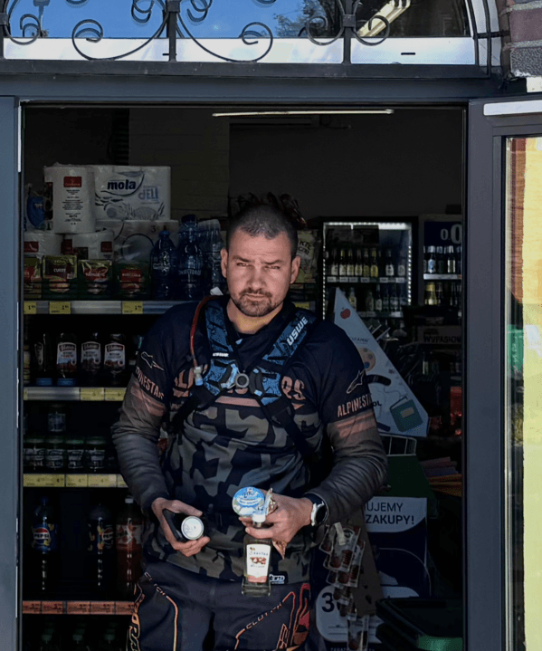 Jimmy Sorting standing in a shop doorway with refreshments